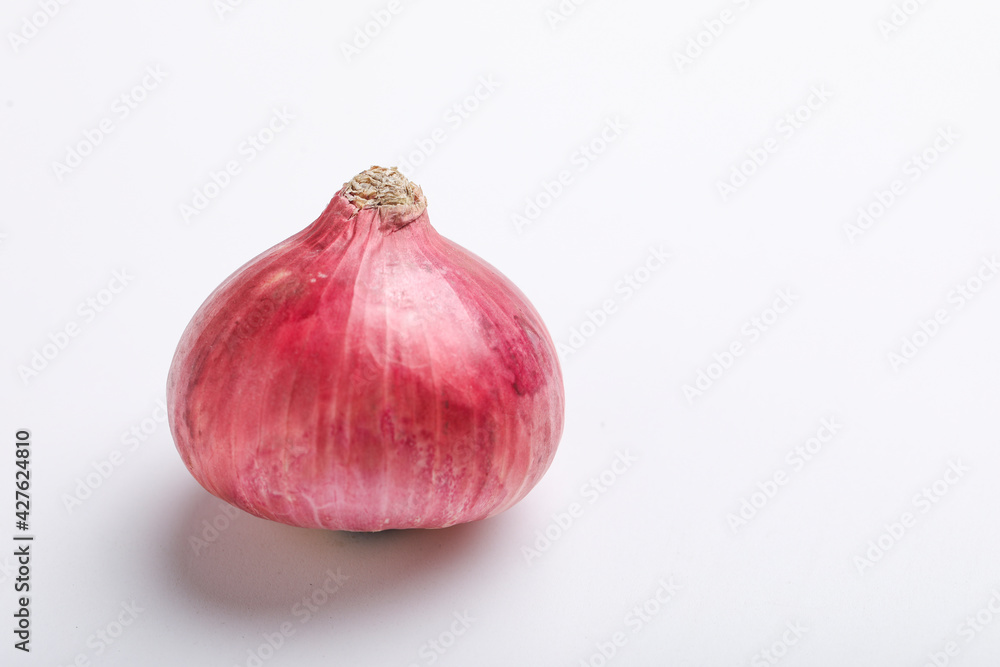 Fototapeta premium Red onion on white background.