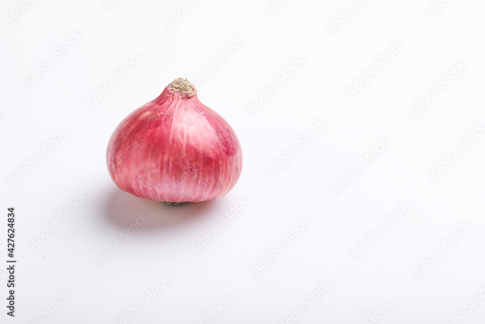Fototapeta premium Red onion on white background.