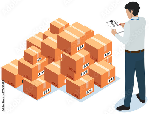Man makes notes while working with parcels in warehouse. Cardboard boxes for shipment from china