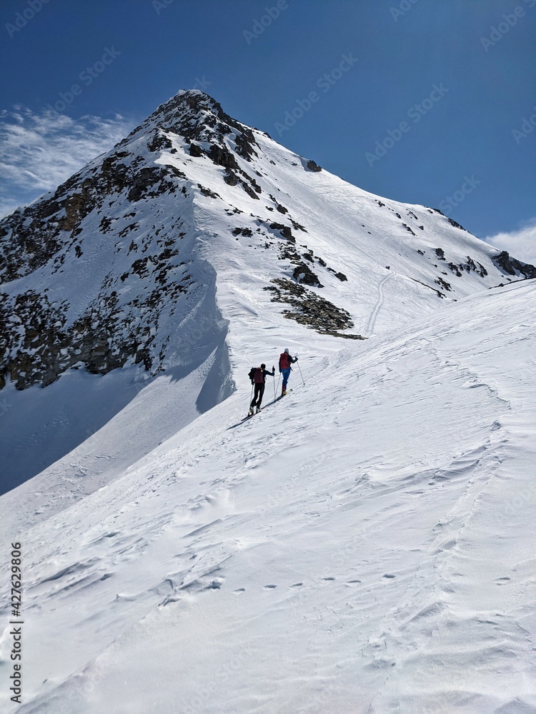 ski tour on the fanellhorn above vals grisons. Ascent over the west flank. Beautiful snowy mountains, mountaineering