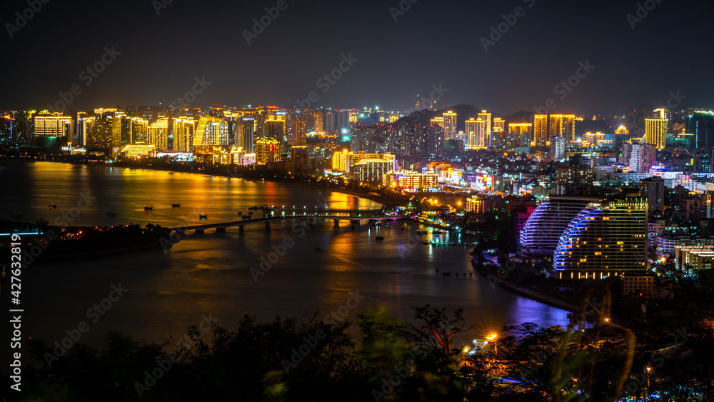 Sanya city nightscape with illuminated buildings in Sanya Hainan China