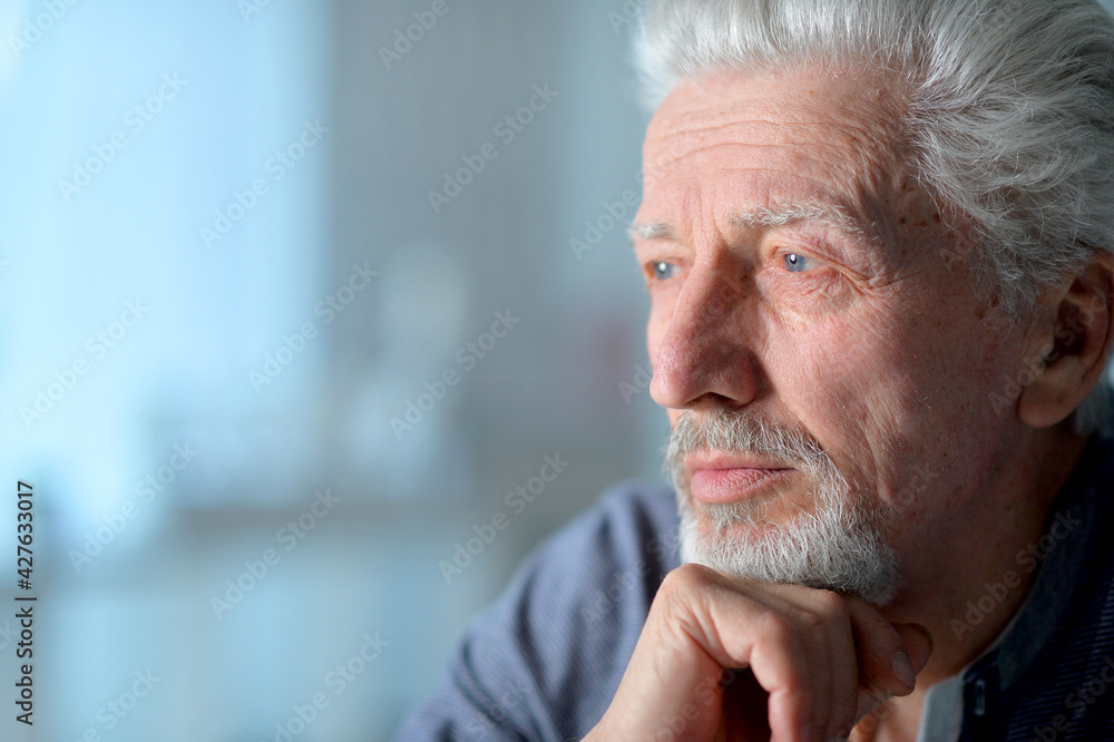Close up portrait of thoughtful senior man Close up portrait of thoughtful senior man