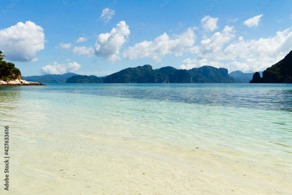 View at the snake island with white sand and crystal clear water at Snake Island in El Nido Palawan, Philippines.