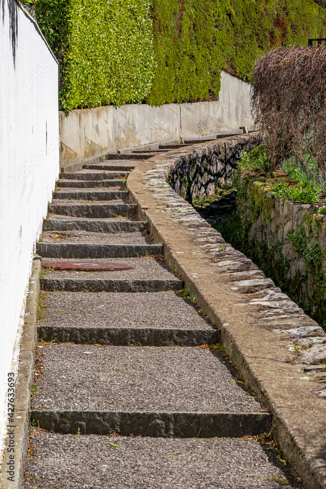 An old stone staircase in swiss village Morcote at Lake Lugano