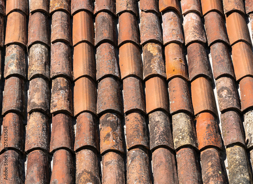 Detail of an old and dirty roof covering on a house in Morcote on Lake Lugano © Taljat