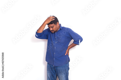 Headache pain  with south indian man sad face