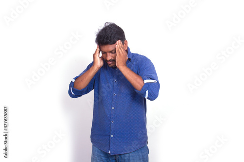 Headache pain  with south indian man sad face