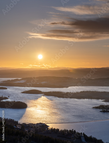 Golden hour over Steinsfjorden, a branch of Lake Tyrifjorden located in Buskerud, Norway. View from Kongens Utsikt (Royal View) at Krokkleiva photo