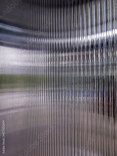 Black silver mirror wave glass vertical line pattern in effect of shiny light backdrops.