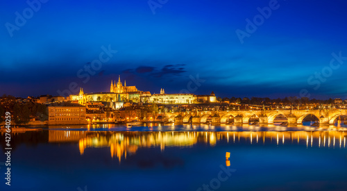 View of Charles Bridge Karluv most and Prague Castle Prazsky hrad in twilight. Panorama