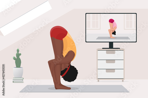 afro american woman yoga education, practicing stretching at home with instructor by video on TV on Internet online