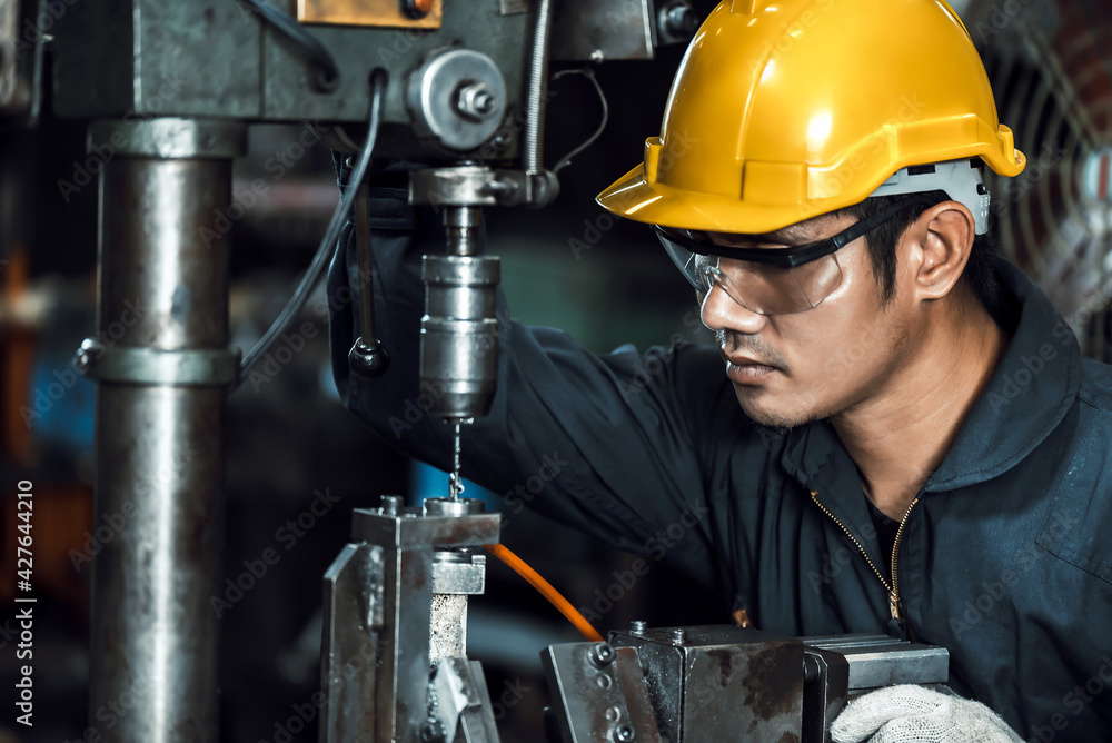 engineer mechanic man working metal machine at factory, worker at industrial working concept engineer mechanic man working metal machine at factory, worker at industrial working concept