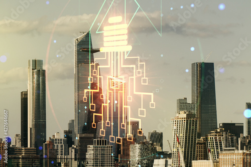 Virtual creative light bulb illustration with microcircuit on New York cityscape background, future technology concept. Multiexposure