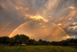The rainbow over the landscape is always a light and colorful theater. The main performers are light and color.