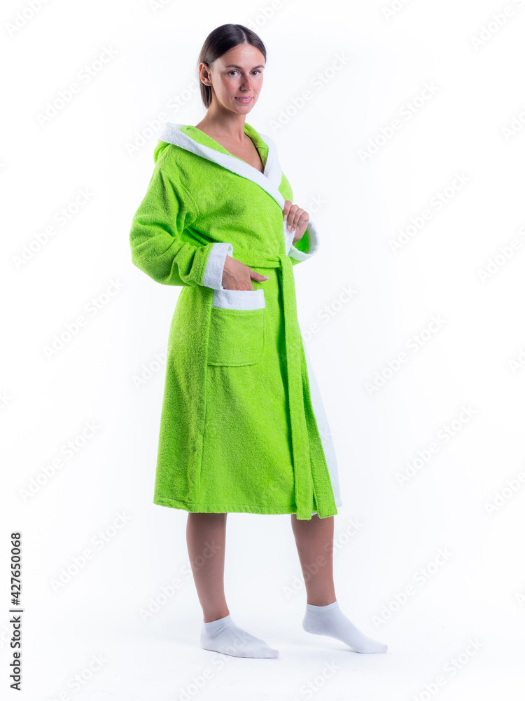 woman in a Bathrobe on an isolated white background with a smile on her face. woman in a Bathrobe on an isolated white background with a smile on her face.