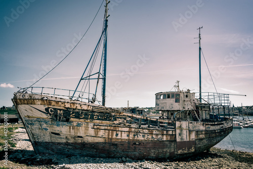 Shipwreck in the boat cemetery of Camaret sur mer, Finistere, Brittany photo