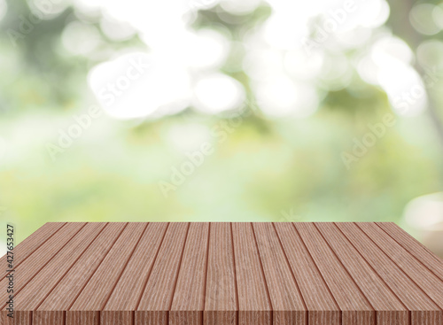 wooden table space for product Abstract natural bokeh sunlight background tree stock photo