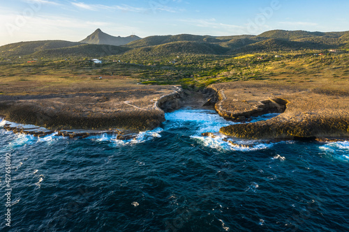 Aerial view above scenery of Curacao, Caribbean with ocean, coast