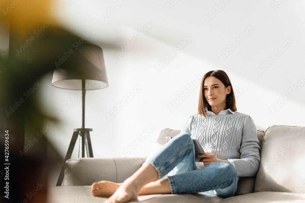 Middle aged woman using digital tablet Middle aged woman using digital tablet
