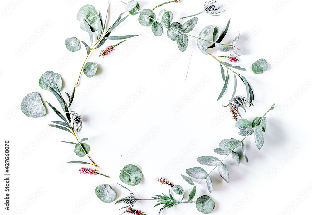 floral concept with green leaves on white background top view mock-up