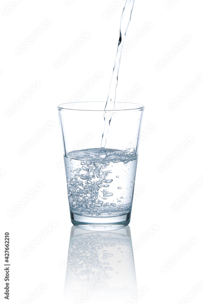 Pour drinking water into a clear glass.with Clipping Path. Pour drinking water into a clear glass.with Clipping Path.