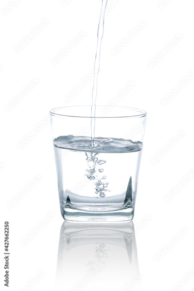 Pour water into a whiskey glass with air bubbles.with Clipping Path. Pour water into a whiskey glass with air bubbles.with Clipping Path.