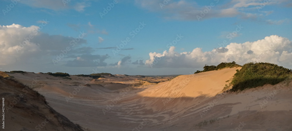 a beautiful dune and blue sky at santa catarina, brazil