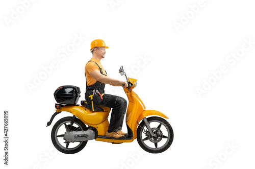 happy worker riding a scooter with construction tool