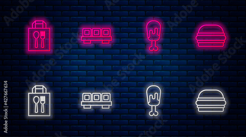 Set line Sushi on cutting board, Chicken leg, Online ordering and delivery and Burger. Glowing neon icon on brick wall. Vector