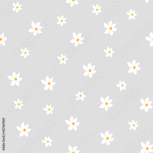 A pattern of white delicate lemon flowers on a gray and blue background. Lemon pattern for fabric, paper, clothing