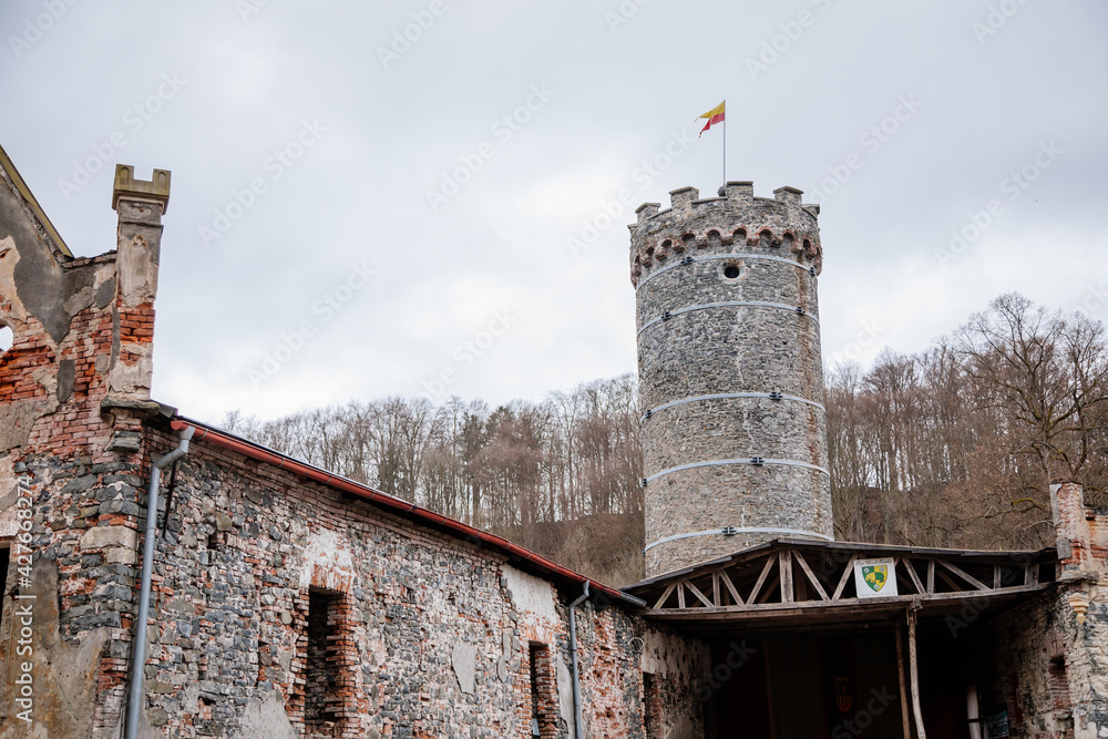 Ruins of Horni Hrad, Medieval Hauenstejn castle, gothic and renaissance or neo-renaissance fragments, ancient chateau, round stone tower, peeling plaster, Bohemia, Czech Republic
