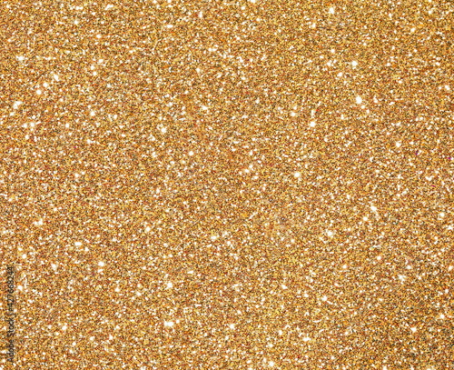 glitter GOLDEN background with glitter and glare of lights