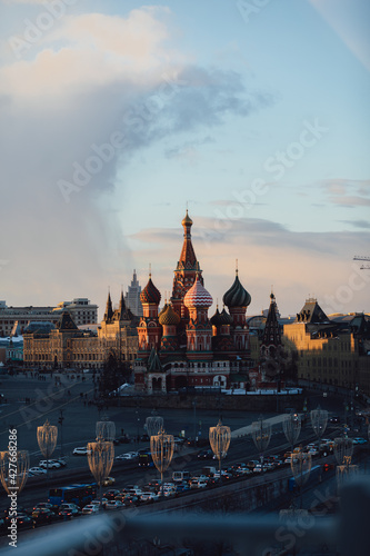 St Basil's Cathedral on Red Square. Ancient Moscow Kremlin is the main tourist attraction of city. Beautiful view of city on sunset.