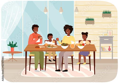 Family members eating natural fresh food. Afro american people are having dinner in kitchen at home