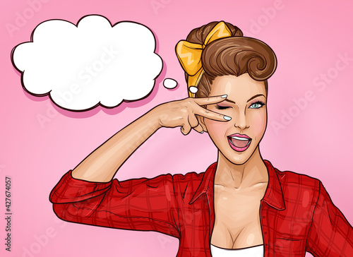Pretty girl with brown hair and open mouth smiling, winking and showing peace sign. Sexy woman on pink background with empty speech bubble. Poster for advertising discounts and sales in pop art style.