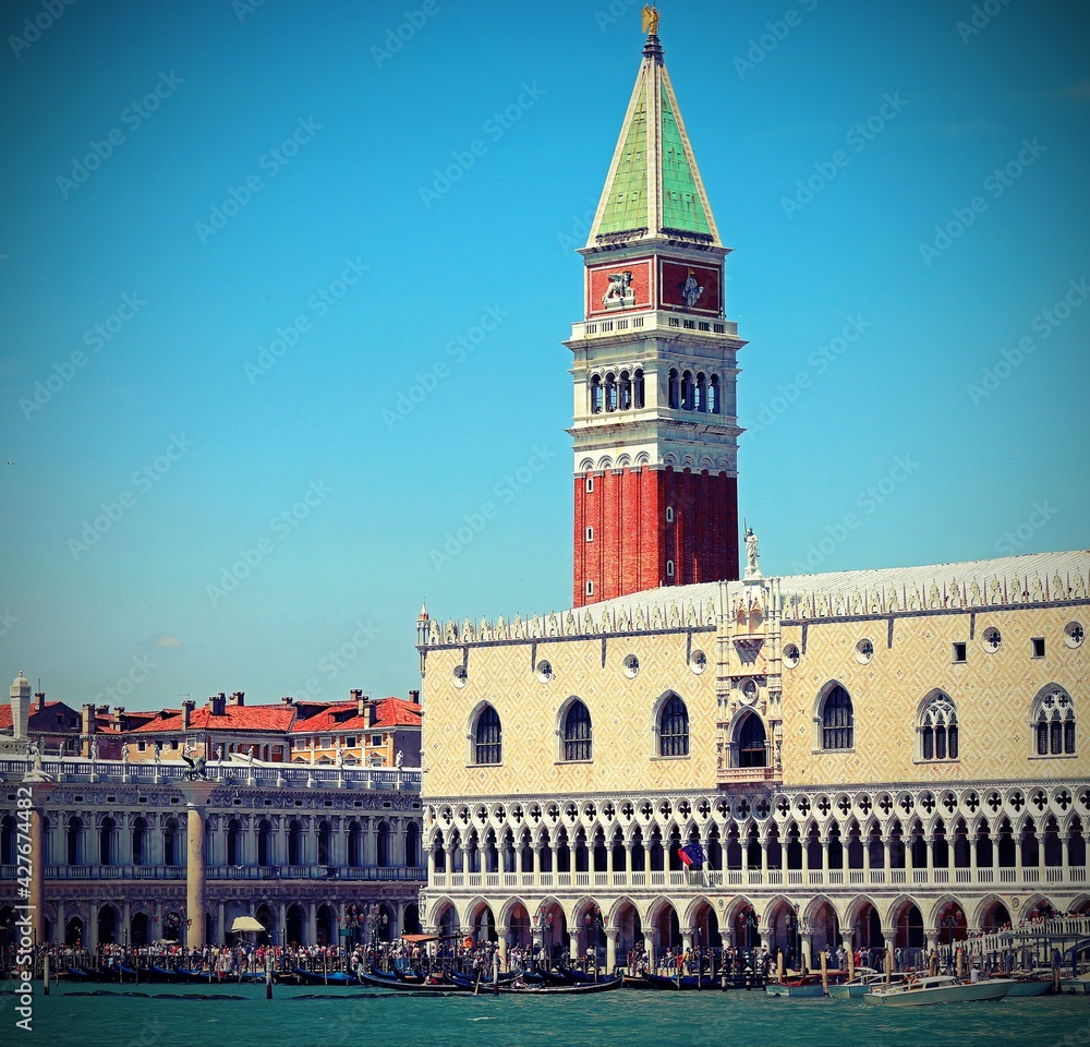 high bell tower form the sea in Venice called Campanile di San Marco with old toned effect