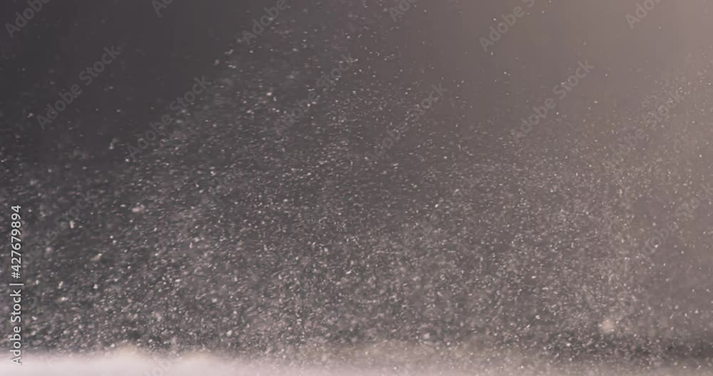 Vidéo Stock CU SUPER SLOW MOTION Woman cook chef sprinkling flour on a ...