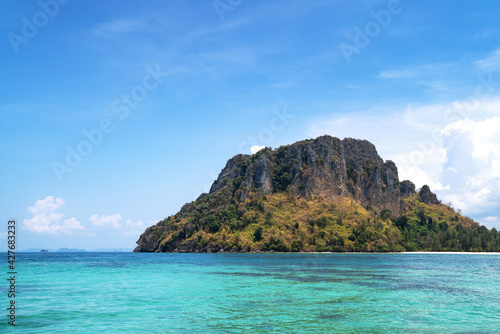 Landscape background for vacation. Beautiful tropical beach with island in Thailand. Blue sky with cloudy on sunny summer season. Seascape with small island. Relaxation and lifestyle concept © bung
