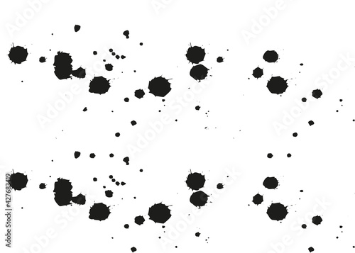 Black blots of ink on paper. Ink splash for design. Abstract background.