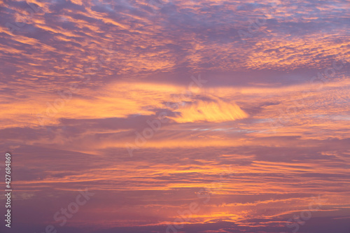 cirrus clouds at sunset over the sea