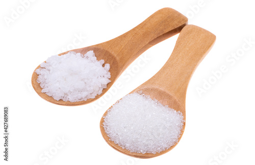 wooden spoon with salt isolated
