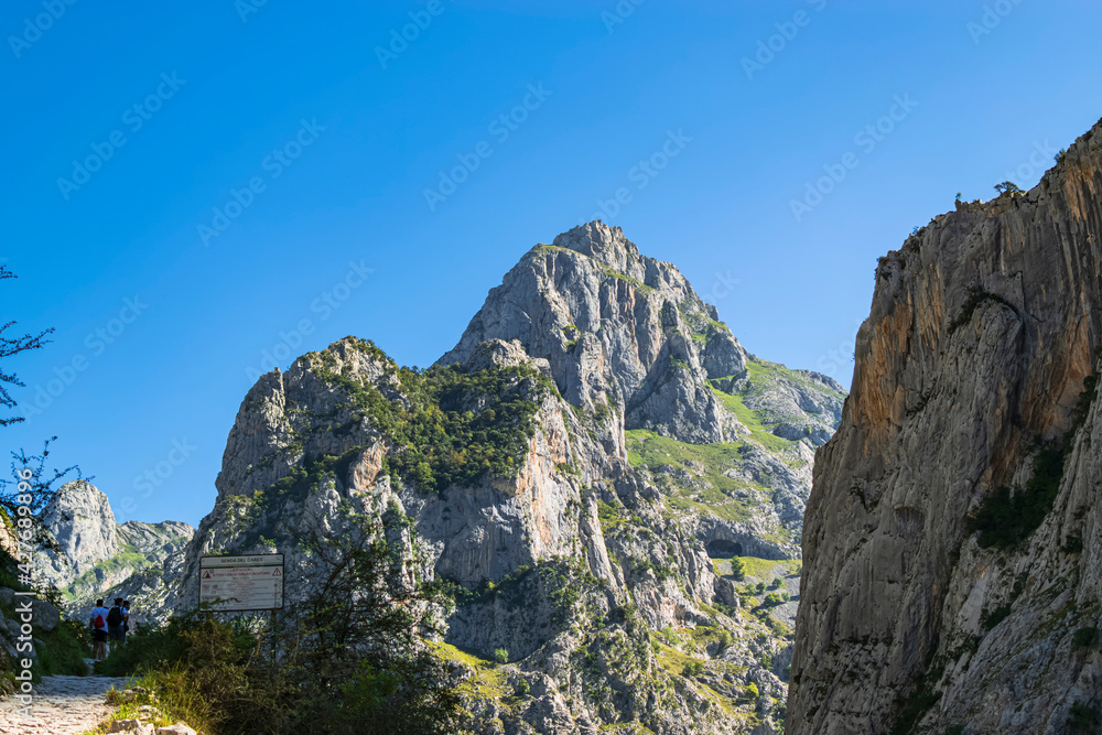 From the beginning of the Cares path, a spectacular view of the majestic mountain. Photograph taken in the Picos de Europa, Asturias, Spain. 