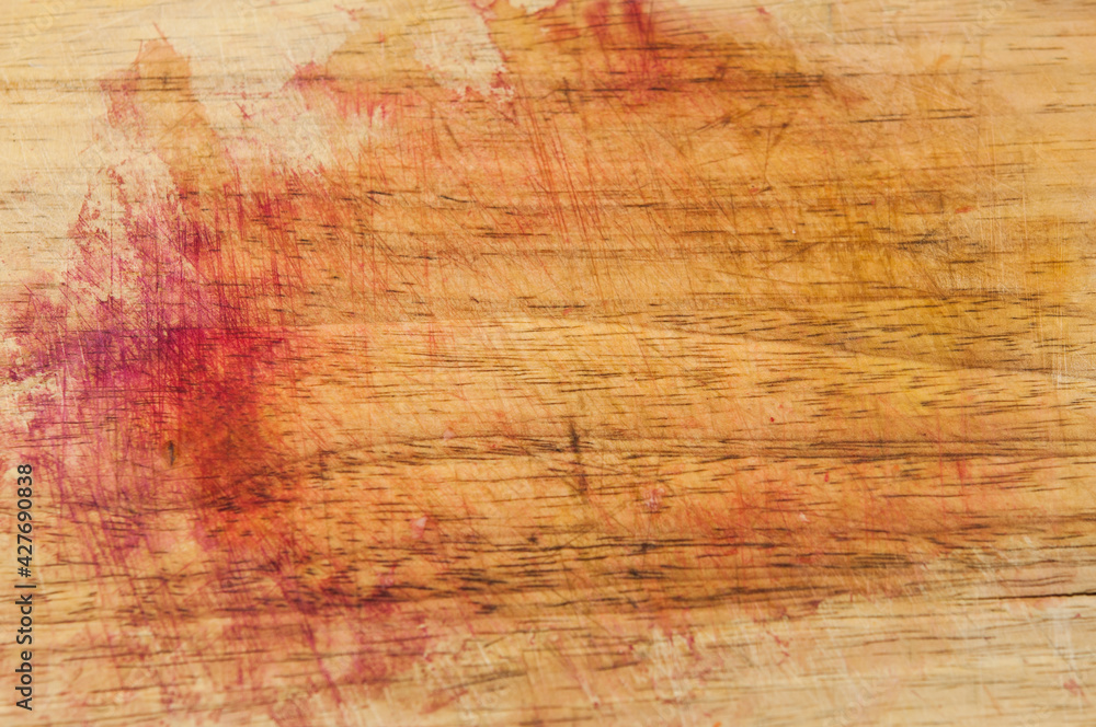 Wooden cutting board with blood background