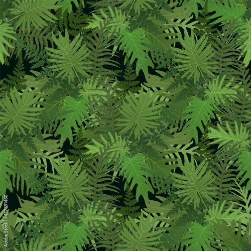 Green vector tropical pattern with jungle leaves decor  seamless fabric background.