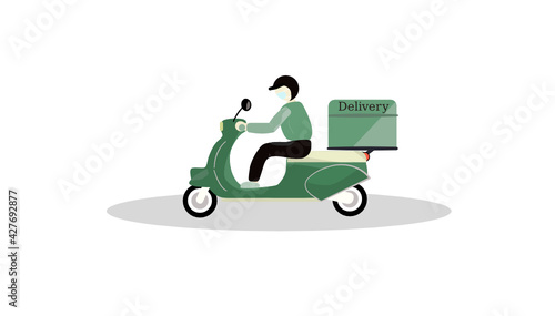 biker man with wearing face mask ride green motorcycle for food delivery