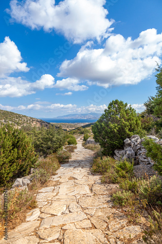The Byzantine Path, a popular trekking trail in Paros island, Cyclades, Greece, Europe, connecting the traditional villages of Lefkes and Prodromos, through fields, hills and spectacular landscape. photo