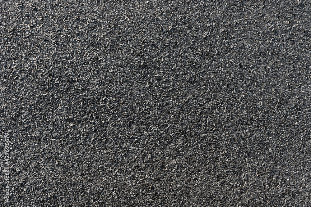 Black bituminous waterproofing. Textured background. Black bituminous waterproofing. Textured background.