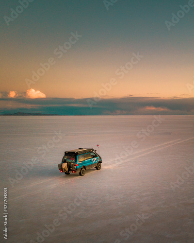 Aerial view of the Uyuni salt flat, reflection in sunset