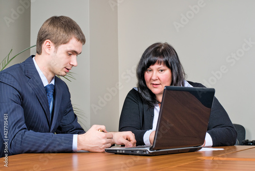 Businesspeople working in office