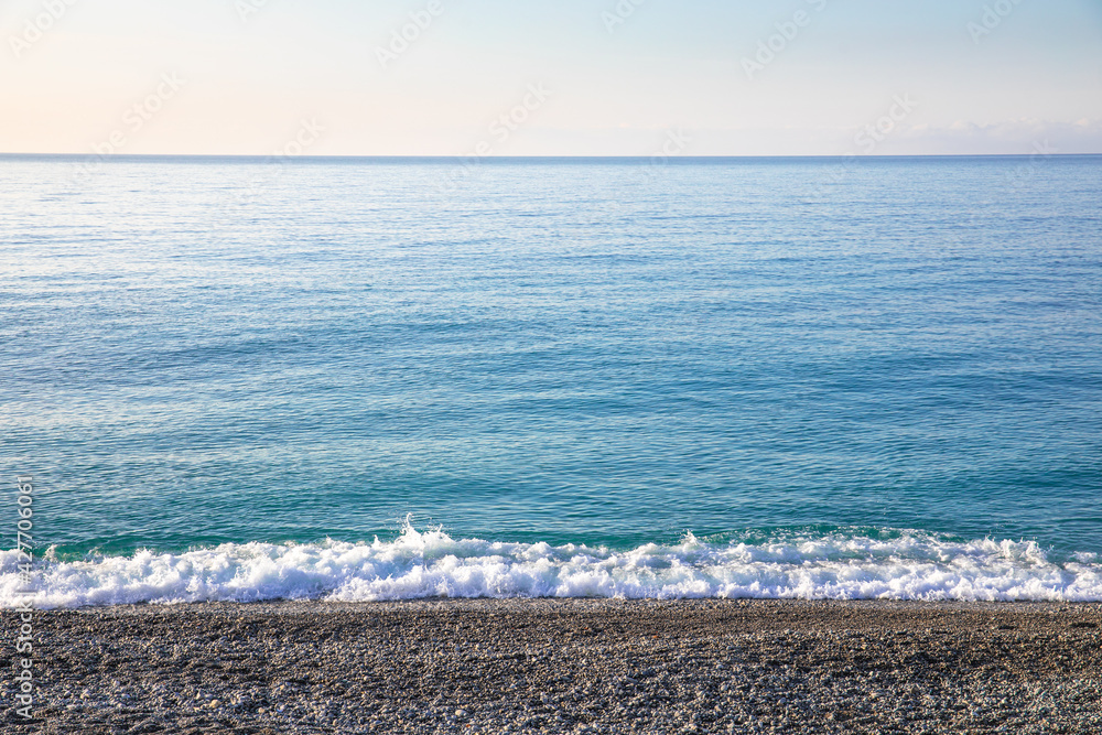 emerald color sea mediterranean and a beach in Nice, south France Europe. blue interior idea. emerald color sea mediterranean and a beach in Nice, south France Europe. blue interior idea.